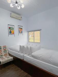 南苑莊園 NanYuan Resort Manor客房内的一张或多张床位