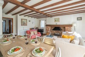 Posezení v ubytování Harvest Cottage