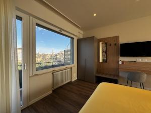 TV o dispositivi per l'intrattenimento presso SKYLINE- 3 Apartments with view
