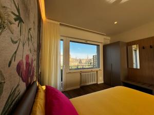 Letto o letti in una camera di SKYLINE- 3 Apartments with view