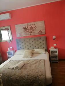 Letto o letti in una camera di Medea rooms palermo centro