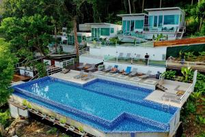 an aerial view of a house with a swimming pool at Alunan Resort in Perhentian Islands
