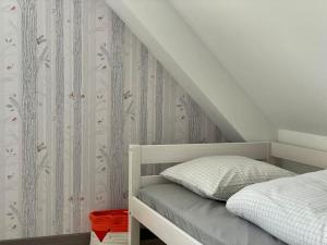 Katil atau katil-katil dalam bilik di Refuge côté Mer #2 by Melrose