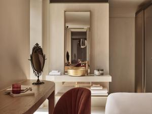 Postel nebo postele na pokoji v ubytování Domus Blanc Boutique Hotel