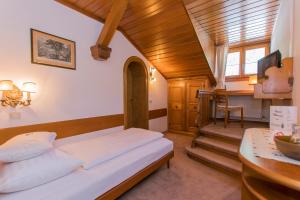 Postel nebo postele na pokoji v ubytování Villa Egger
