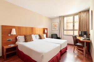 Posteľ alebo postele v izbe v ubytovaní Hotel Best Aranea