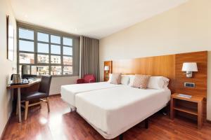 Posteľ alebo postele v izbe v ubytovaní Hotel Best Aranea