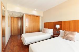 Posteľ alebo postele v izbe v ubytovaní Hotel Best Aranea