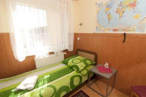 Postel nebo postele na pokoji v ubytování Willa Mewa