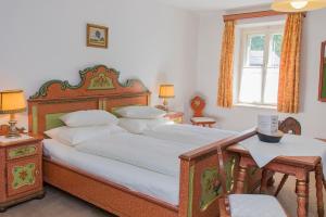 Postel nebo postele na pokoji v ubytování Villa Egger