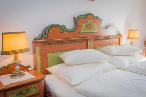 Postel nebo postele na pokoji v ubytování Villa Egger