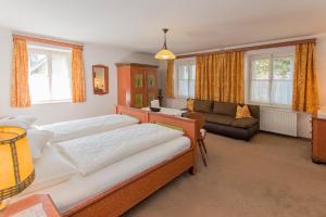 מיטה או מיטות בחדר ב-Villa Egger