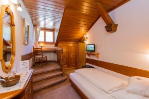 Postel nebo postele na pokoji v ubytování Villa Egger