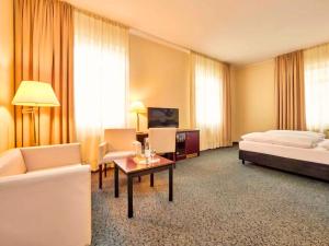 Postel nebo postele na pokoji v ubytování Augustiner Hotel