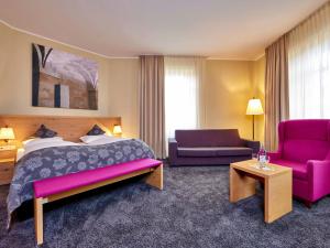 Postel nebo postele na pokoji v ubytování Augustiner Hotel