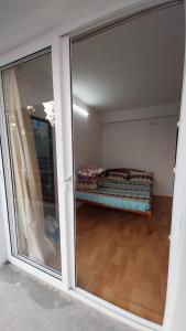 Postel nebo postele na pokoji v ubytování Dumfu Homestay