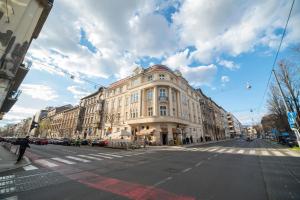 a large building on a city street with at Imperial Apartment B in Zagreb