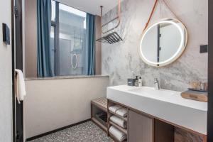 Foto dalla galleria di Yizhi Hotel - Guangzhou East Railway Station Tianpingjia Subway Station a Canton