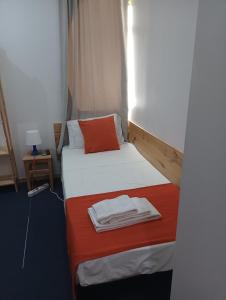מיטה או מיטות בחדר ב-Al-Xelb guesthouse
