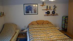 Ein Bett oder Betten in einem Zimmer der Unterkunft Appartement Claudia