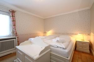 Ένα ή περισσότερα κρεβάτια σε δωμάτιο στο Krauthahn Anbau