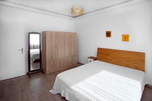 Ένα ή περισσότερα κρεβάτια σε δωμάτιο στο Dimitra