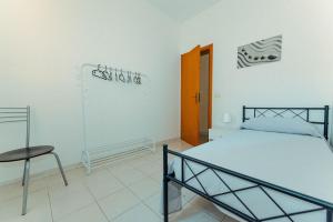 Postel nebo postele na pokoji v ubytování Casa di Mirabella