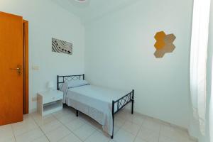Postel nebo postele na pokoji v ubytování Casa di Mirabella