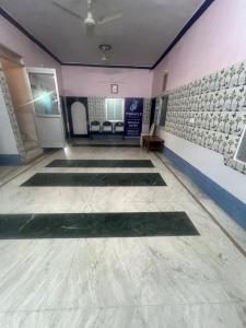 a room with mats on the floor of a room at Mahesh Guest House Ajmer in Ajmer