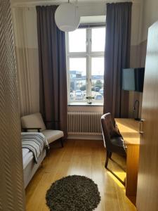 Postel nebo postele na pokoji v ubytování Hamnhotellet Kronan