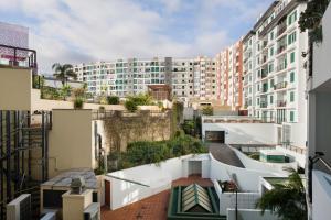a view from the balcony of a building at Forum T0 Plus in Ilhéu do Gorgulho