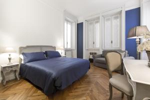 A bed or beds in a room at Household Settembrini