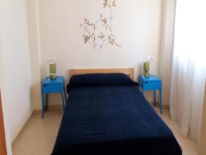 Postel nebo postele na pokoji v ubytování Apartamentos Los Almendros 3000