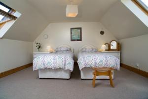 Katil atau katil-katil dalam bilik di Y Bwthyn St Nicholas