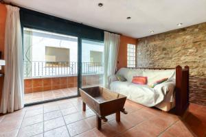 A bed or beds in a room at Casa Puig Rom 45 Roses - Immo Barneda