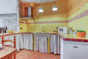 A kitchen or kitchenette at Casa Puig Rom 45 Roses - Immo Barneda