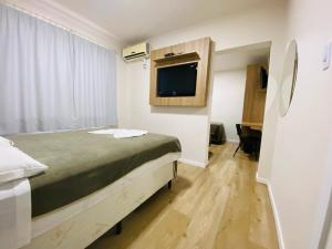 Katil atau katil-katil dalam bilik di Hotel Paris
