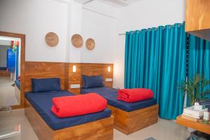 Postel nebo postele na pokoji v ubytování Mezenga 2 - Premium Backpackers Hostel