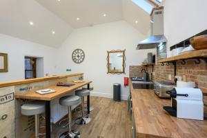 a kitchen with a counter and a counter top at Old Town Loft in Cupar