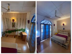 een slaapkamer met 2 bedden en een kamer met ramen bij Seconds Colombo in Colombo