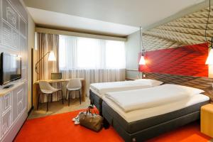 Postel nebo postele na pokoji v ubytování ibis Innsbruck