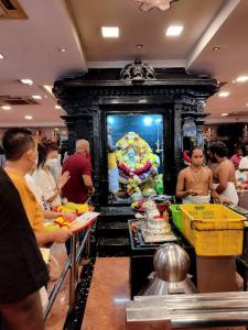 a group of people standing around in a store at HSK Hotel Kuala Lumpur in Kuala Lumpur