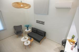 Posezení v ubytování Mylos Modern Apartments,By Idealstay Experience