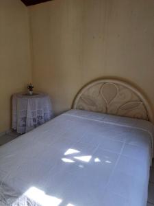 מיטה או מיטות בחדר ב-Chalé na Serra Cozinha Completa 2 quartos Cama Casal