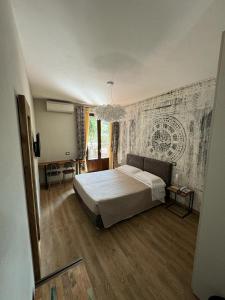 Postel nebo postele na pokoji v ubytování AgriHotel Villa Ambra