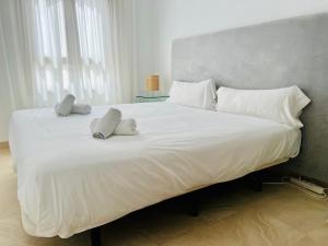Posteľ alebo postele v izbe v ubytovaní Maison Élégante au Cœur du Golf de la Cala