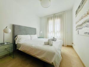 Posteľ alebo postele v izbe v ubytovaní Maison Élégante au Cœur du Golf de la Cala