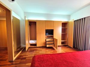 Postel nebo postele na pokoji v ubytování Hotel Dunas d'Ovar