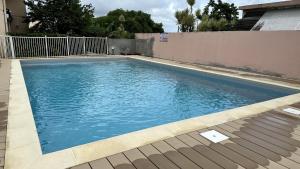 The swimming pool at or close to Ti Caraïbes, appartement T3 atypique, vue mer, piscine et proche plage