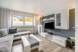TV a/nebo společenská místnost v ubytování Ferienwohnung My Suite Home